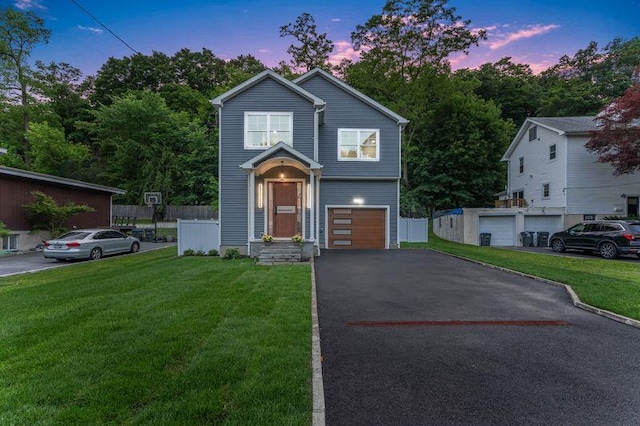 105 Valley Rd, White Plains, NY 10604 - traditional-style home featuring driveway and an attached garage