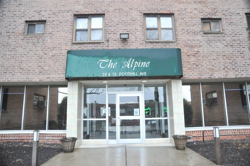 204-15 Foothill Ave Unit B21, Hollis, NY 11423 - property entrance with brick siding