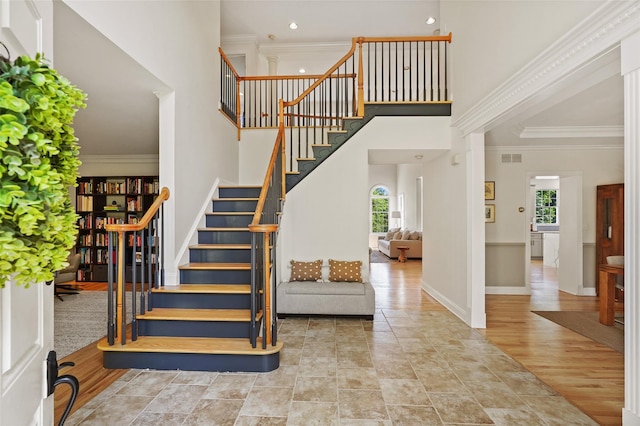 10 Inverness Ct, White Plains, NY 10605 - stairs featuring plenty of natural light, a high ceiling, ornamental molding, and recessed lighting