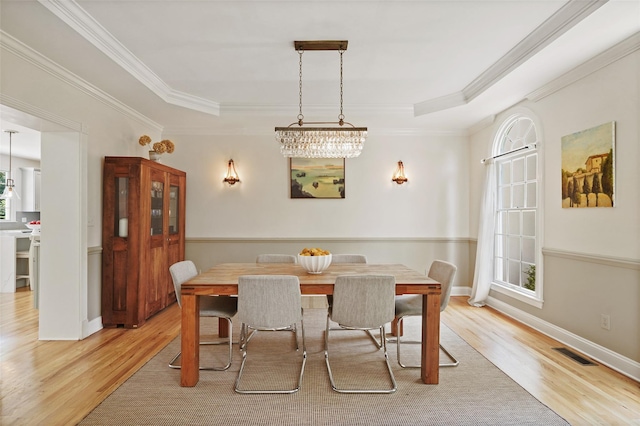 10 Inverness Ct, White Plains, NY 10605 - dining space with wood finished floors, ornamental molding, and a tray ceiling
