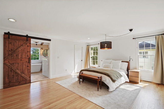 10 Inverness Ct, White Plains, NY 10605 - bedroom with multiple windows, light wood-type flooring, crown molding, a barn door, and recessed lighting