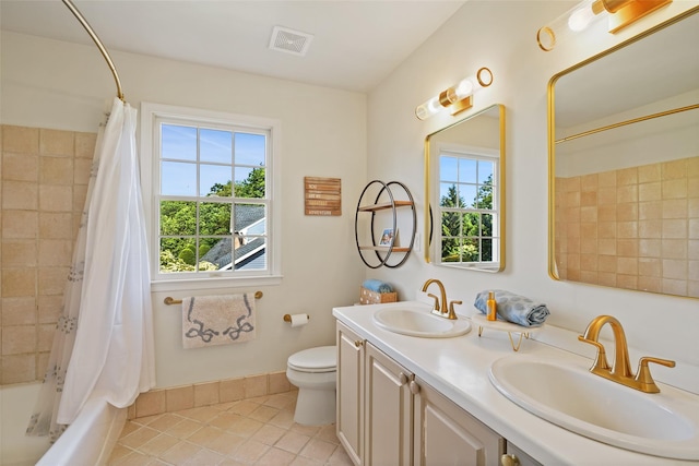 10 Inverness Ct, White Plains, NY 10605 - full bath featuring healthy amount of natural light, tile patterned flooring, double vanity, and shower / bath combo with shower curtain
