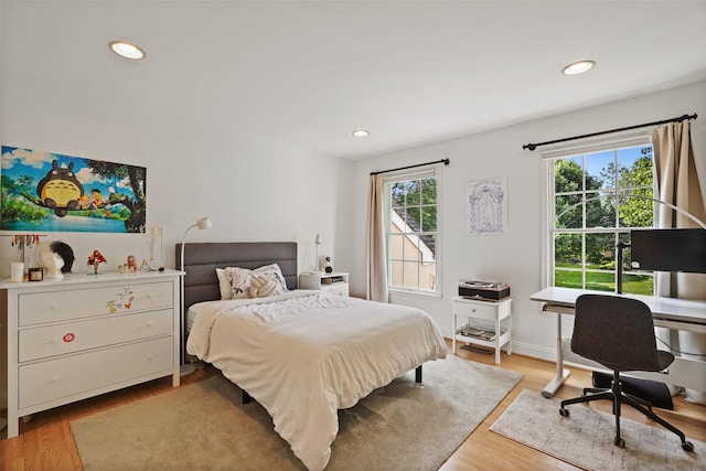 10 Inverness Ct, White Plains, NY 10605 - bedroom with recessed lighting, light wood finished floors, and an office area