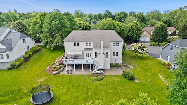 10 Inverness Ct, White Plains, NY 10605 - rear view of property featuring a patio, a wooden deck, a yard, stairway, and stucco siding