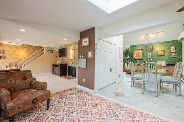 17 Piper Ln, Levittown, NY 11756 - living room with an accent wall, stairway, recessed lighting, a fireplace, and a wall mounted AC