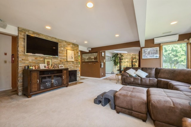 17 Piper Ln, Levittown, NY 11756 - living area featuring a wall mounted AC, carpet floors, recessed lighting, and a stone fireplace