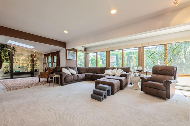 17 Piper Ln, Levittown, NY 11756 - living area featuring carpet, healthy amount of natural light, beam ceiling, recessed lighting, and a skylight