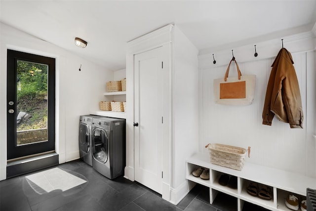 1223 Albany Post Rd, Croton-On-Hudson, NY 10520 - laundry area with separate washer and dryer and dark tile patterned floors