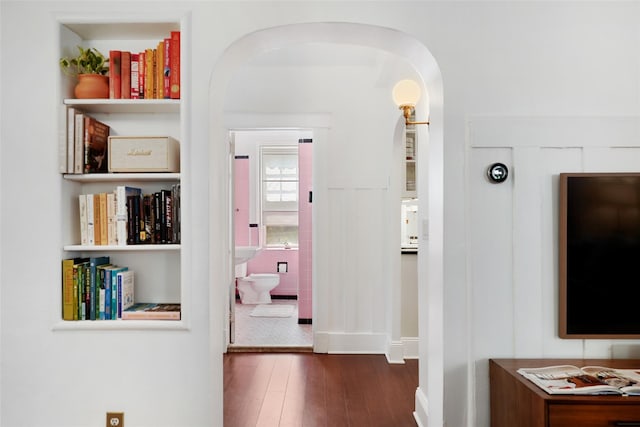1223 Albany Post Rd, Croton-On-Hudson, NY 10520 - hall with arched walkways and wood finished floors