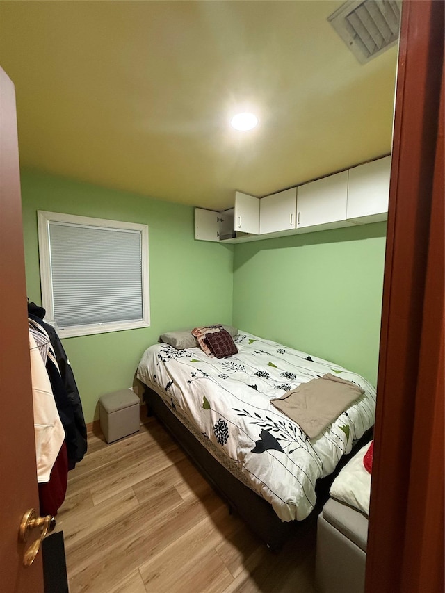 1016 Howells Rd, Bay Shore, NY 11706 - bedroom featuring light wood-type flooring and recessed lighting