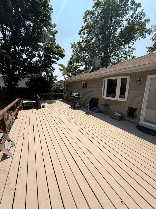 1016 Howells Rd, Bay Shore, NY 11706 - wooden terrace featuring a grill and outdoor dining space