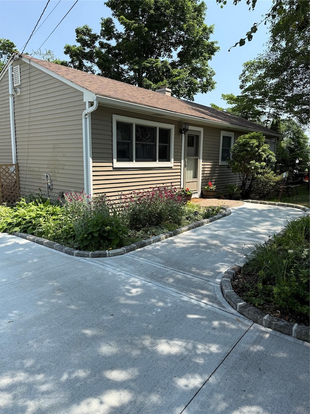 1016 Howells Rd, Bay Shore, NY 11706 - view of front of property featuring a shingled roof