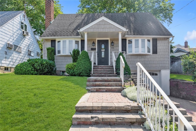 95 Falmouth Pl, Albertson, NY 11507 - bungalow-style house with a shingled roof, a front lawn, an attached garage, and a chimney