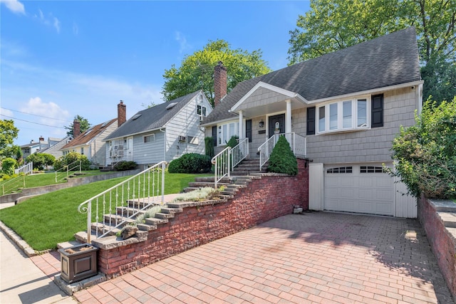 95 Falmouth Pl, Albertson, NY 11507 - view of front facade with a garage, a shingled roof, a front lawn, decorative driveway, and a residential view