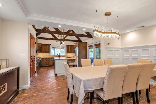 95 Falmouth Pl, Albertson, NY 11507 - dining area featuring recessed lighting, crown molding, and a chandelier