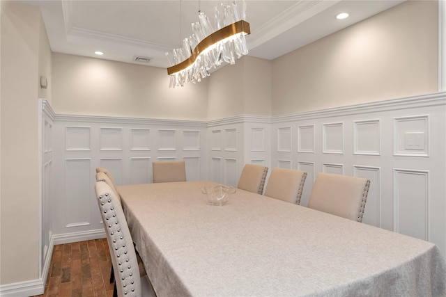 95 Falmouth Pl, Albertson, NY 11507 - dining room with ornamental molding, dark wood finished floors, recessed lighting, a raised ceiling, and a decorative wall
