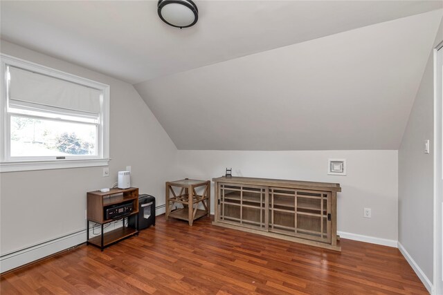 95 Falmouth Pl, Albertson, NY 11507 - additional living space featuring wood finished floors, lofted ceiling, and baseboard heating