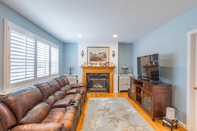 195 Bridle Way, Oakdale, NY 11769 - living area with a fireplace, light wood-type flooring, and recessed lighting