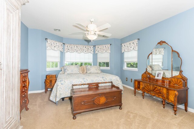 195 Bridle Way, Oakdale, NY 11769 - bedroom with carpet flooring and a ceiling fan