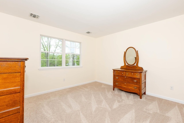 195 Bridle Way, Oakdale, NY 11769 - bedroom with light carpet and baseboards