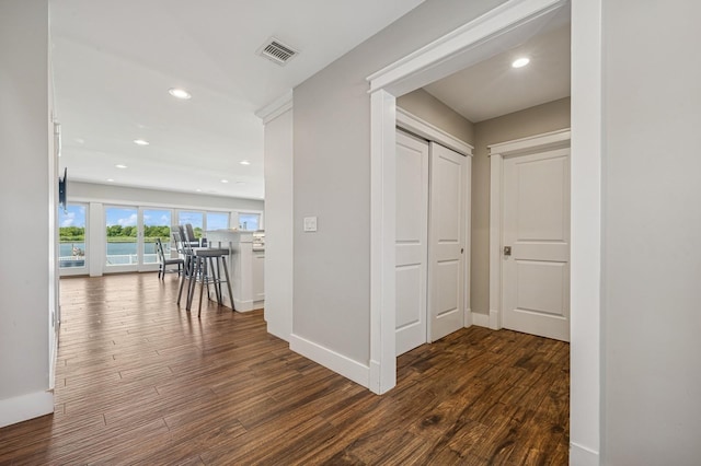 26 Island Pkwy N, Island Park, NY 11558 - corridor featuring dark wood finished floors and recessed lighting