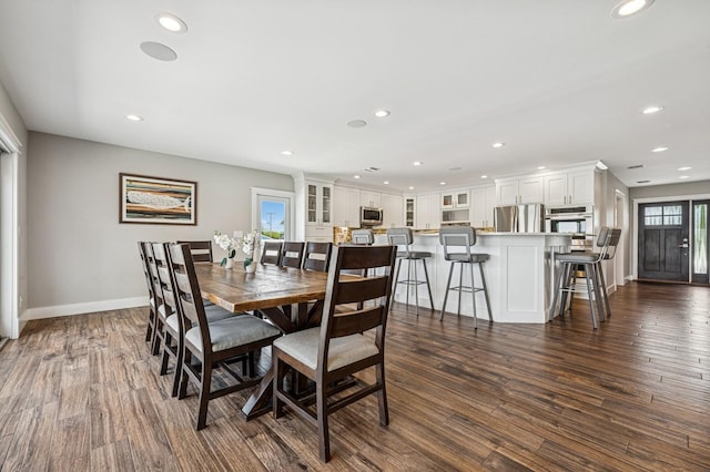 26 Island Pkwy N, Island Park, NY 11558 - dining space featuring dark wood finished floors and recessed lighting