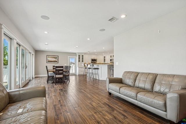 26 Island Pkwy N, Island Park, NY 11558 - living area with dark wood-style floors and recessed lighting