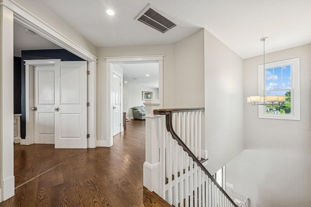 26 Island Pkwy N, Island Park, NY 11558 - hallway featuring an upstairs landing, dark wood finished floors, and recessed lighting