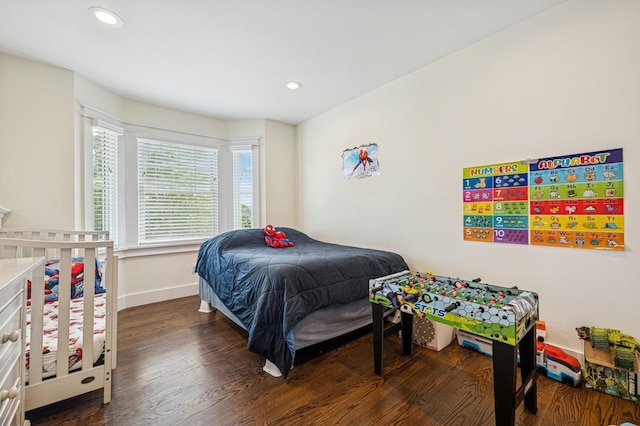 26 Island Pkwy N, Island Park, NY 11558 - bedroom with wood finished floors and recessed lighting
