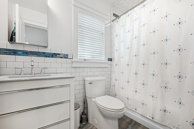 26 Island Pkwy N, Island Park, NY 11558 - bathroom with vanity, curtained shower, and tile walls