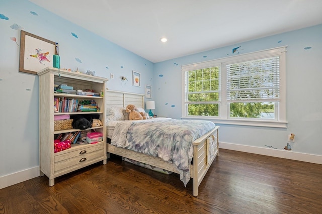 26 Island Pkwy N, Island Park, NY 11558 - bedroom with dark wood-style flooring and recessed lighting