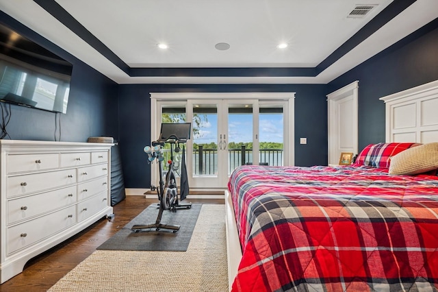 26 Island Pkwy N, Island Park, NY 11558 - bedroom with a raised ceiling, access to exterior, dark wood-type flooring, french doors, and recessed lighting