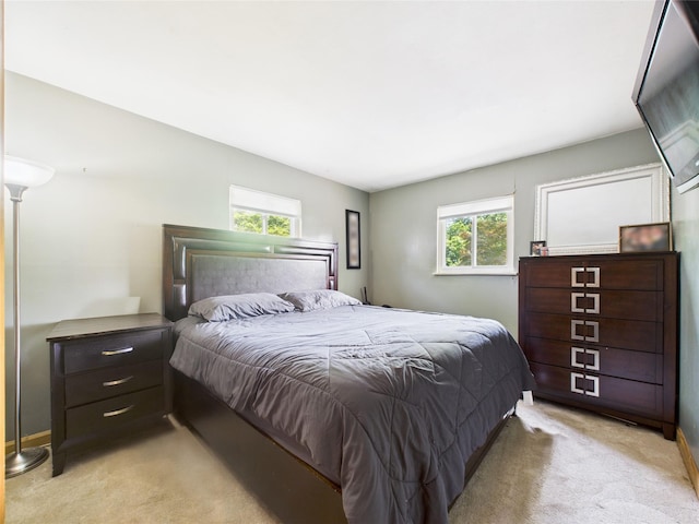 18 Huron St, Port Jefferson Station, NY 11776 - bedroom featuring light colored carpet and multiple windows