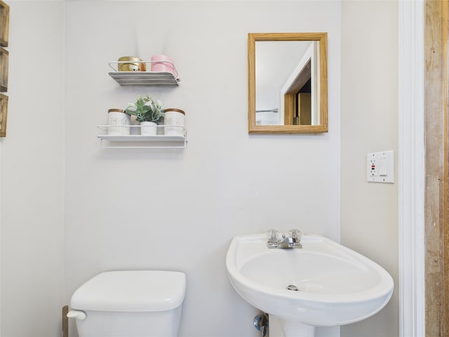 18 Huron St, Port Jefferson Station, NY 11776 - half bath featuring toilet and a sink