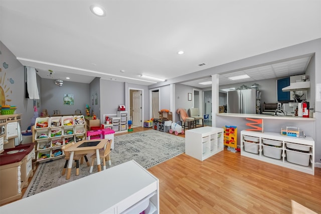 48 Orchard Hill Rd, Carmel, NY 10512 - rec room with wood finished floors and recessed lighting