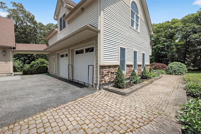2300 State Route 207, Rock Tavern, NY 12575 - view of property exterior featuring stone siding and driveway