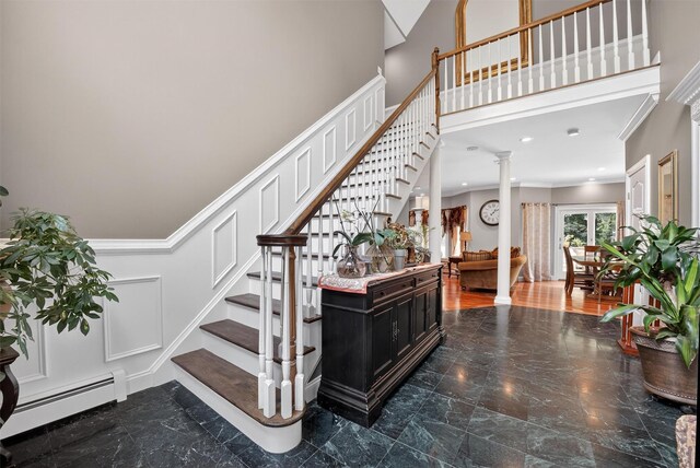 2300 State Route 207, Rock Tavern, NY 12575 - stairs with baseboard heating, crown molding, ornate columns, and marble tiled floors