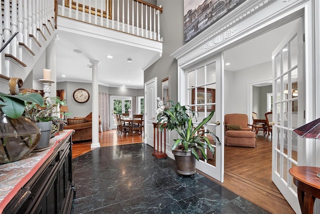 2300 State Route 207, Rock Tavern, NY 12575 - entrance foyer featuring french doors, crown molding, ornate columns, a towering ceiling, and recessed lighting