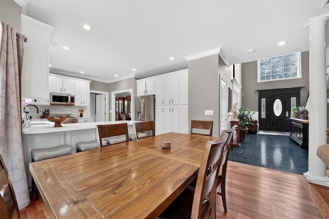 2300 State Route 207, Rock Tavern, NY 12575 - dining room featuring hardwood / wood-style floors, recessed lighting, decorative columns, and ornamental molding