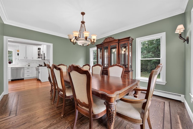 2300 State Route 207, Rock Tavern, NY 12575 - dining space with a chandelier, crown molding, light wood finished floors, and a baseboard heating unit