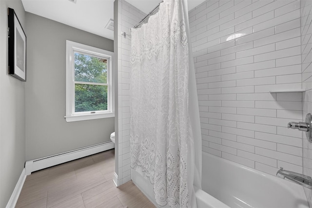 2300 State Route 207, Rock Tavern, NY 12575 - bathroom with baseboard heating and shower / bath combination with curtain
