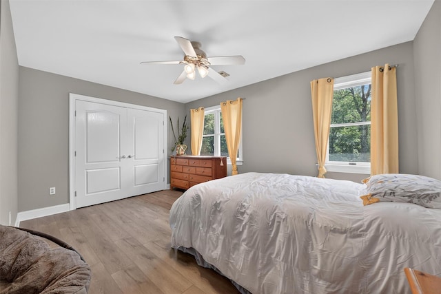 2300 State Route 207, Rock Tavern, NY 12575 - bedroom featuring wood finished floors, a closet, and a ceiling fan