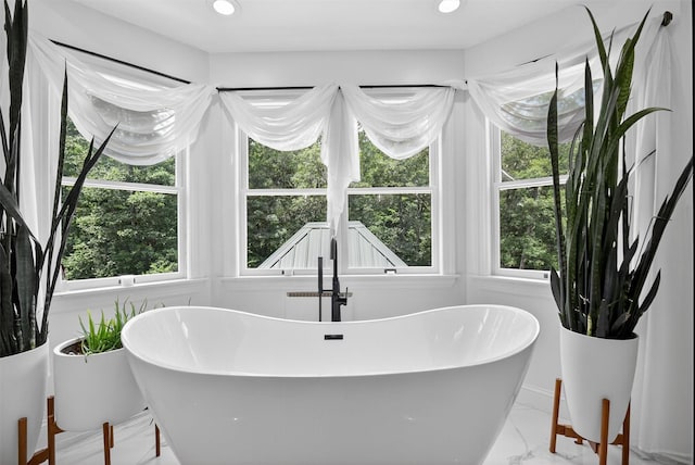 2300 State Route 207, Rock Tavern, NY 12575 - bathroom featuring marble finish flooring, a soaking tub, and recessed lighting