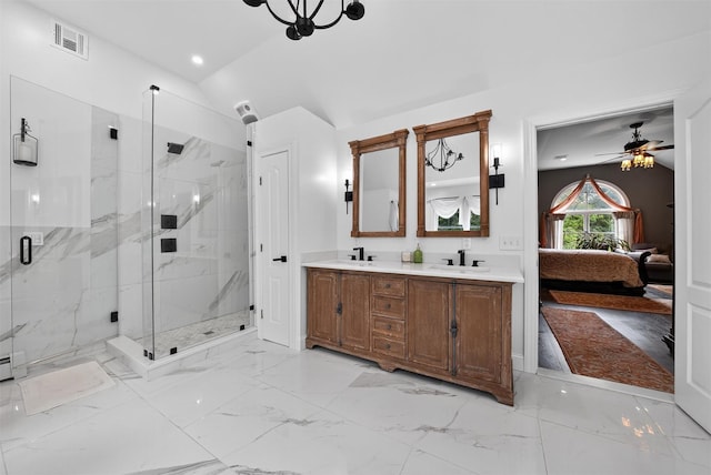 2300 State Route 207, Rock Tavern, NY 12575 - ensuite bathroom with a marble finish shower, vaulted ceiling, double vanity, marble look tiles, and a ceiling fan