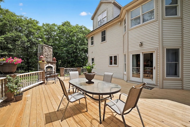 2300 State Route 207, Rock Tavern, NY 12575 - deck with an outdoor stone fireplace and outdoor dining area