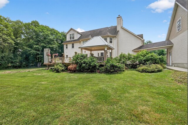 2300 State Route 207, Rock Tavern, NY 12575 - rear view of house featuring a gazebo, a lawn, a chimney, and a deck
