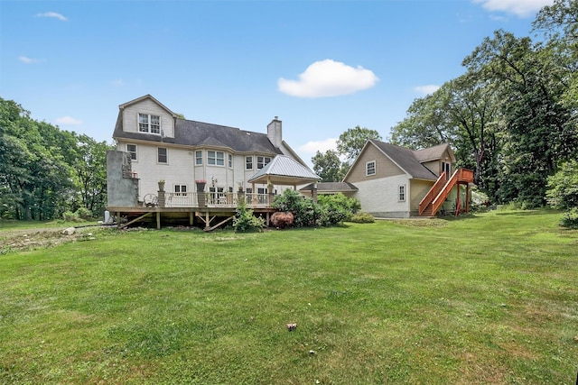 2300 State Route 207, Rock Tavern, NY 12575 - rear view of property with a deck, stairway, a chimney, and a yard