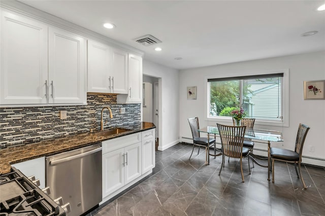 185 Harvard Dr, Plainview, NY 11803 - kitchen with stainless steel dishwasher, tasteful backsplash, white cabinets, recessed lighting, and a baseboard radiator
