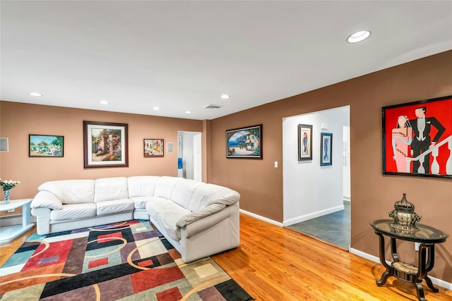 185 Harvard Dr, Plainview, NY 11803 - living room with wood finished floors and recessed lighting