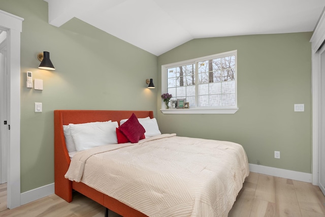13 Ripley Rd, Patterson, NY 12563 - bedroom with wood finished floors and lofted ceiling